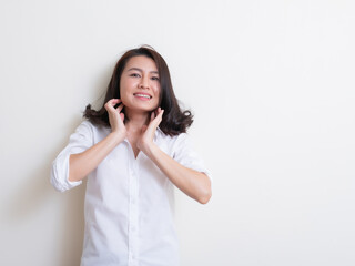 Portrait of young asian woman standing and smiling