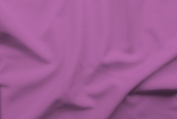 Abstract folded purple clothes mesh background . Dark tone wallpaper