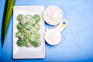 Local food known as Buah Melaka isolated over blue background