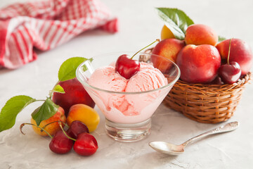 Fototapeta na wymiar ice cream, berries and fruit on a table, selective focus