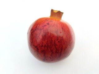 fresh healthy sweet pomegranate isolated on white background