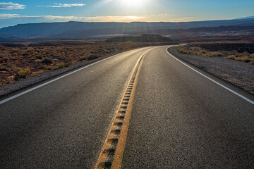 Road in the desert at dawn
