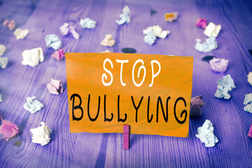 Conceptual hand writing showing Stop Bullying. Concept meaning voicing out their campaign against...