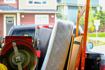 Trash items loaded on a truck to be disposed of at a landfill
