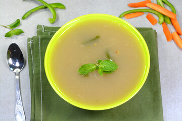Vegetable soup prepared with green vegetables