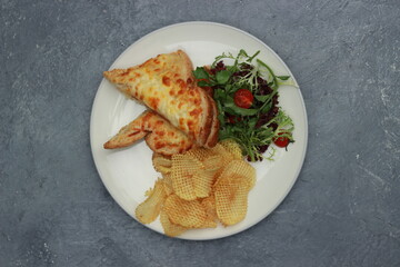 Quesadilla bread on a plate with healthy vegetables on the table. Food photography