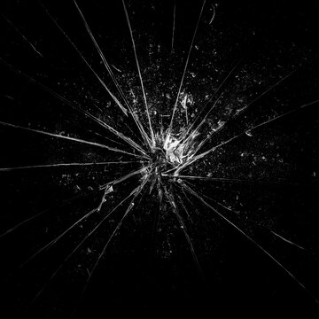 Broken glass background in black. Black minimalist background with cracks on the glass. Abstract black minimalism.