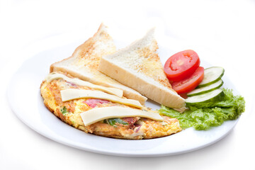 Omelette filled with onion, onion, celery and cheese. Served with toast, tomatoes, cucumber and lettuce.