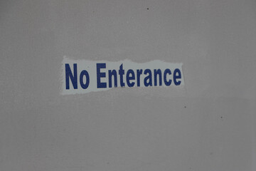 Misspelled entrance sign