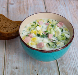 Okroshka cold soup with vegetables and herbs