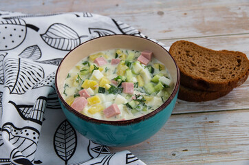 Okroshka cold soup with vegetables and herbs