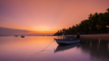 Colorful twilight in evening over seascape at Baan khai beach, Koh Phangan, Thailand. Long exposure photography.