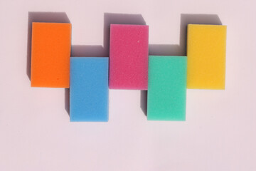 Sponges for cleaning isolated on a white background. Sponges for washing dishes. Flat lay