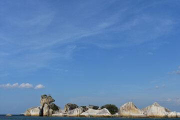 Blue crystal beaches surrounded by granit stones. Tanjung Kelayang Beach,Bangka Belitung island, Indonesia