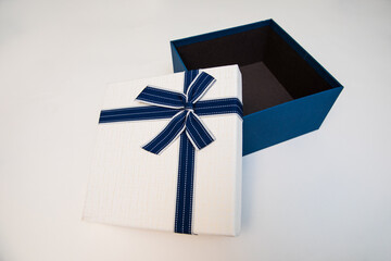 Blue and white gift packaging box on a white background.