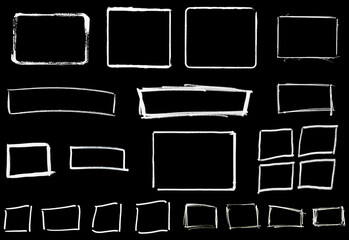 Sammlung von handgemalten weißen Rahmen auf schwarzem Hintergrund