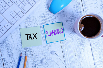 Handwriting text writing Tax Planning. Conceptual photo analyzing financial income and planning...