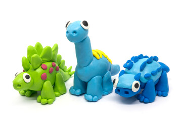 Play dough group Stegosaurus, Brachiosaurus, Ankylosaurus on white background. Handmade clay...