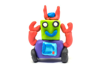 Play dough robot on white background. Handmade clay plasticine