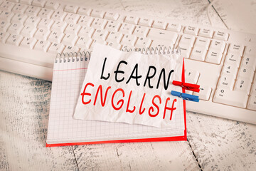 Handwriting text Learn English. Conceptual photo to train writing and speaking, focusing on the...