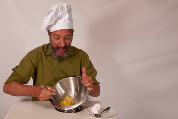 funny chef acting with vegetables