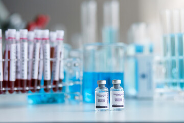 COVID19 Coronavirus vaccine with test tube and syringe injection on the table use for prevention, immunization and treatment from COVID-19 Contagious disease.