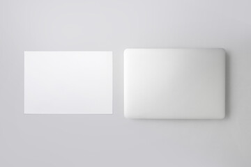 Fototapeta premium Office table with computer paper A4, Top view with copy space.