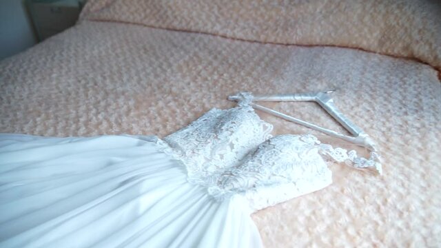 wedding dress bride on the bed