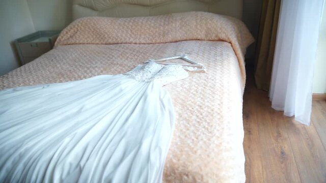 wedding dress bride on the bed