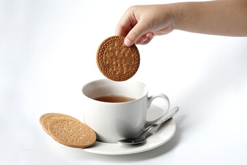 Fresh a cup of tea and some of sweet biscuit