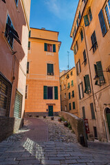 Narrow street in the historic center of Genoa, Italy