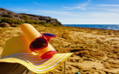 Sun protection gear on sand beach