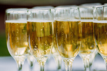 champagne in glasses on the street close up - wedding catering