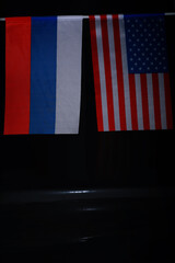 The concept of diplomatic relations. Flag of the Russian Federation and partner. Sanctions pressure...