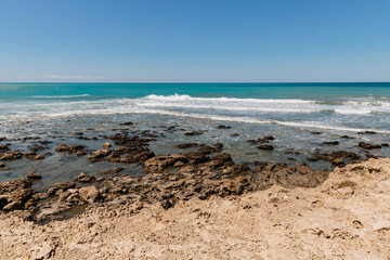 Fototapeta na wymiar beautiful azure sea and rocks
