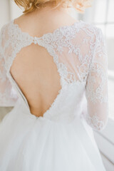 back of the bride in a wedding dress