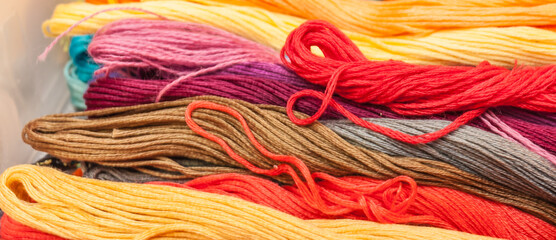 Skeins of colored threads for embroidery