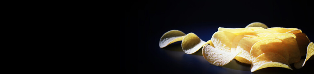 Potato and corn chips. Long banner. Space for text. Snacks and salty appetizer. Flavored Chips.