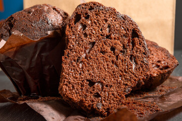 Close-up of dessert chocolate brownie cupcakes on dark background