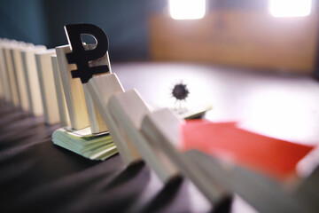 Obraz premium Business concept. The depreciation of the currency of Russia. Symbol of the ruble. Inflation and stagnation. Abstract falling columns symbolizing the economy of country.