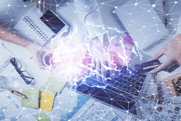 Double exposure of man's hands typing over computer keyboard and brain hologram drawing. Top view. Ai and data technology concept.