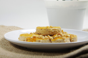 Peanut cookies or kue kacang, a sweet snack that made from peanuts. One of famous snack in Indonesia.