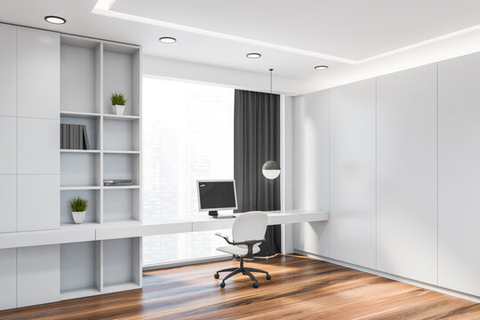 Minimalistic white home office corner