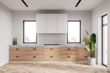 White kitchen interior with wooden countertop