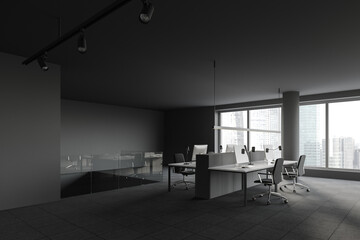 Computer desks in panoramic gray open space office