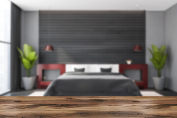 Naklejka premium Table in blurry grey and wooden bedroom