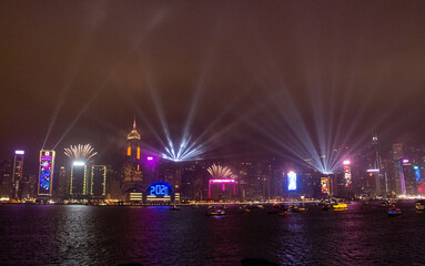 Fototapeta na wymiar New Year celebrations 2020 Hong Kong lights and fireworks across Victoria Harbour