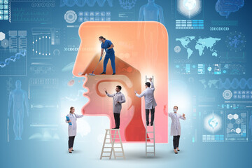Otolaryngology concept with doctors treating patient