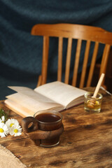 Beautiful cup of coffee on a wooden table.
