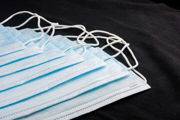 Background concept for news about the novel coronavirus COVID-19 pandemic, antiviral medical mask...